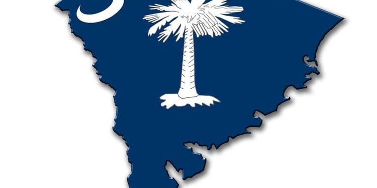 An image of the flag of South Carolina overlaid on a map of South Carolina. The flag features a crescent moon and palm tree on a blue background